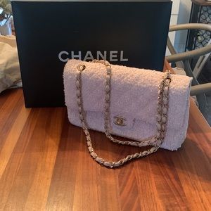 Chanel classic tweed handbag, pink with gold trim.
